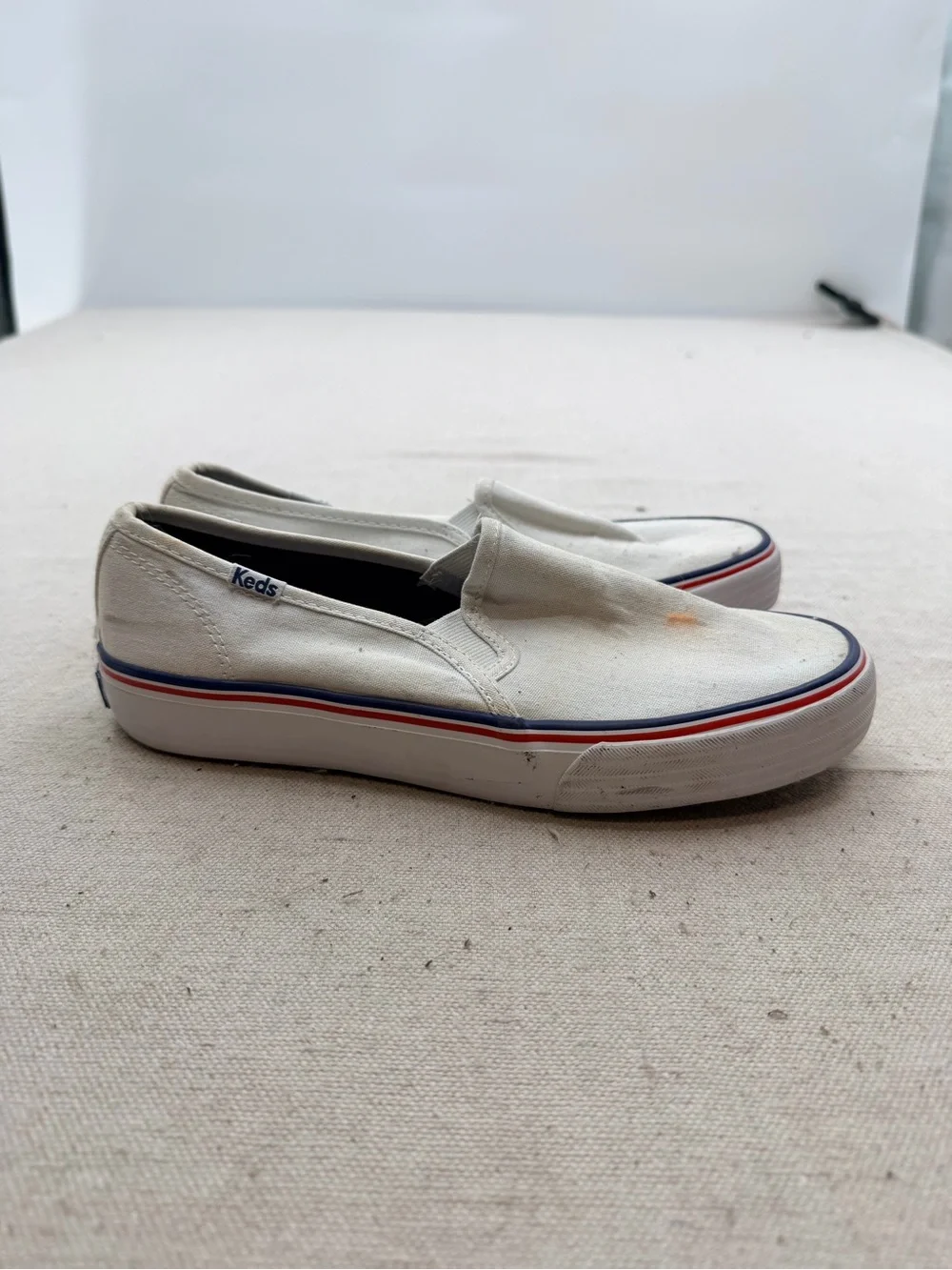Keds White Canvas Slip-On Loafers with Red & Blue Trim